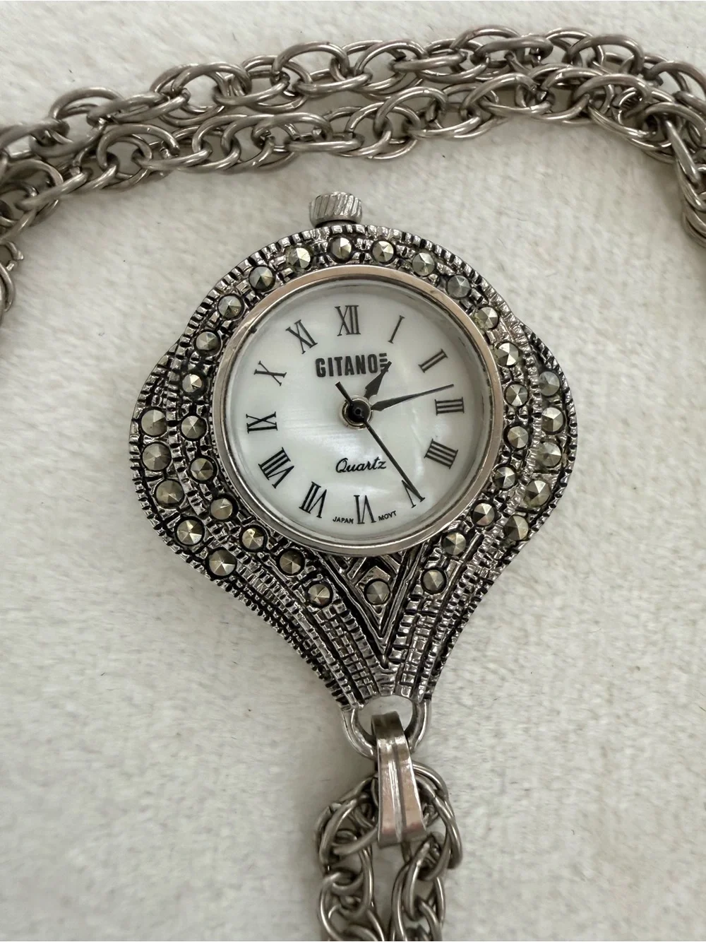This vintage Gitano silver-tone marcasite pendant necklace watch quartz Japan